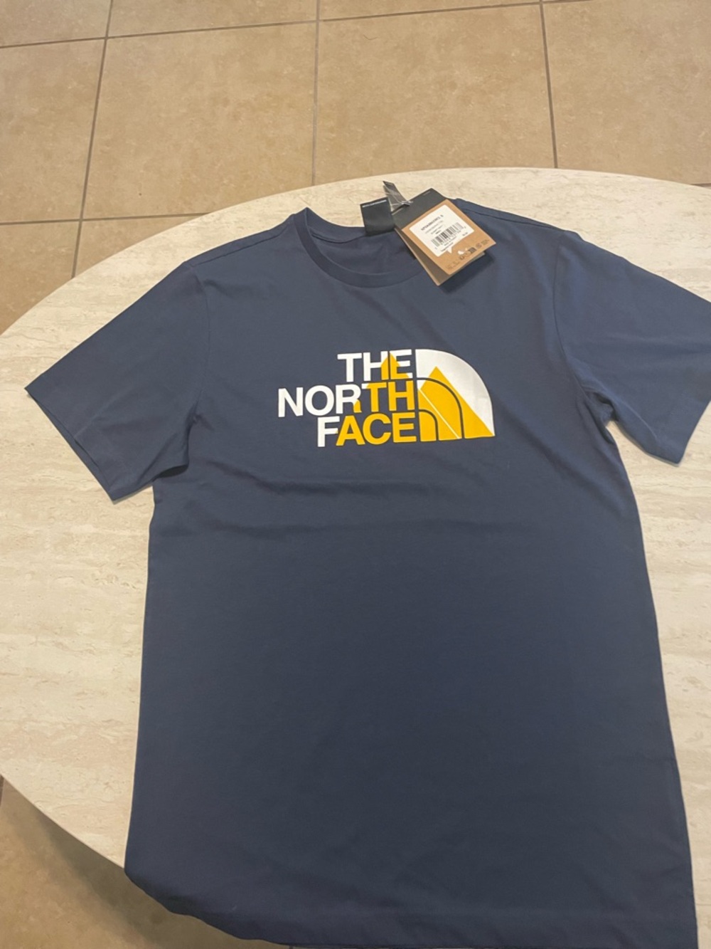 The North Face Men’s Navy Short Sleeve Logo Tee with Yellow Accent